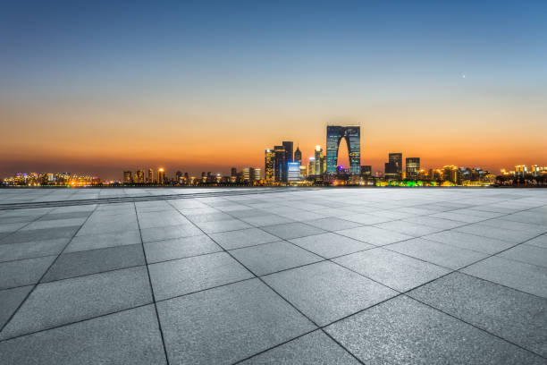 istock Panoramic skyline and buildings with empty square floor at dusk 1615468362
