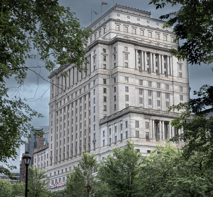 Montreal, Quebec, Canada - July 31, 2023:  The Sunlife Building in downtown Montreal is an iconic element of the city's skyline.  It was originally built for the Sunlife Insurance company.  Today it hosts various tenants and businesses.