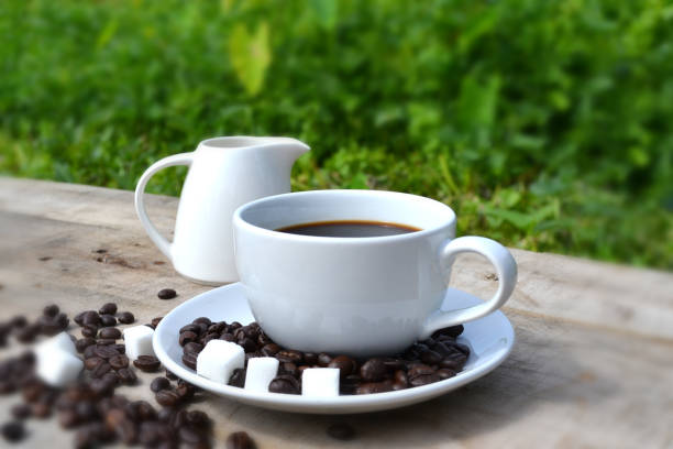 istock Coffee mug on wooden floor with background 1615494855