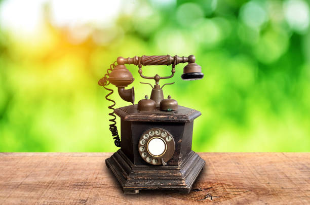 istock Old wooden phone. Use rotation. 1615495362