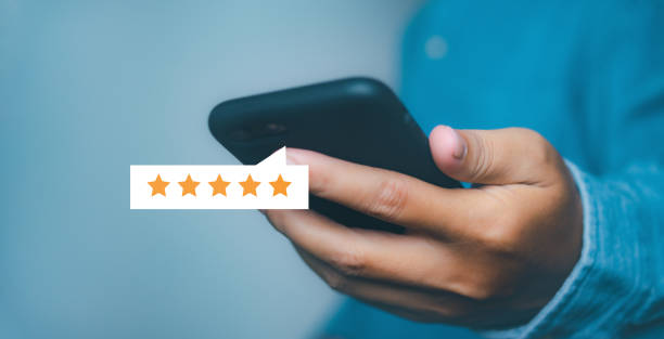 istock Businessman touching giving high score for feedback review satisfaction service. Customer satisfaction experience with five star icon and excellent for feedback review satisfaction service. 1615497921