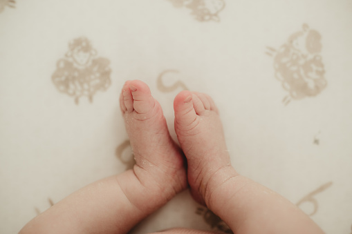 Asian girl baby feet close up