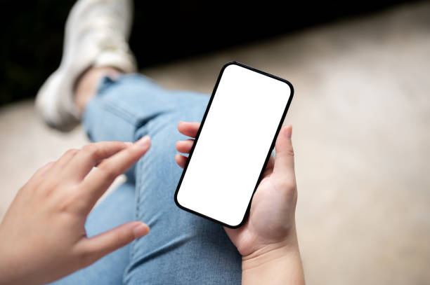 istock Top view image of a female using her smartphone while sitting indoors. 1615626411