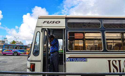 Mahebourg, Mauritius - Jan 4, 2017. A bus stopping at station in Mahebourg, Mauritius. Mahebourg knew major development around 1806 during the French colonisation era.