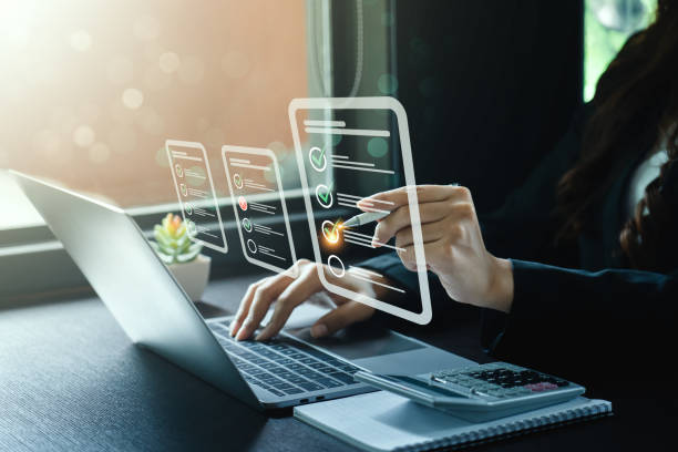 istock Business performance checklist, businessman using laptop doing online checklist survey, Check marks on checklist and Filling online form or answering questions. evaluation, online survey, online exam. 1615695479
