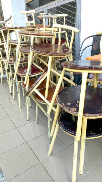 istock Stack of steel wooden chairs 1615762705