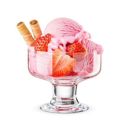Strawberry pink ice cream scoops served on a glass dessert bowl isolated on white background.