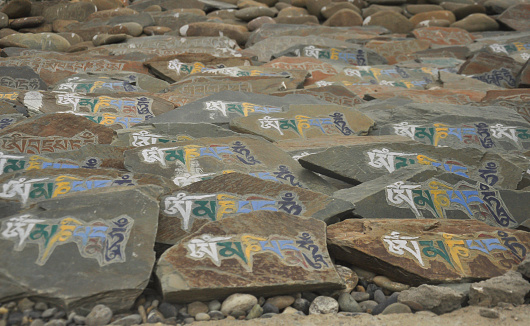 Mani stones with Buddhist mantra \
