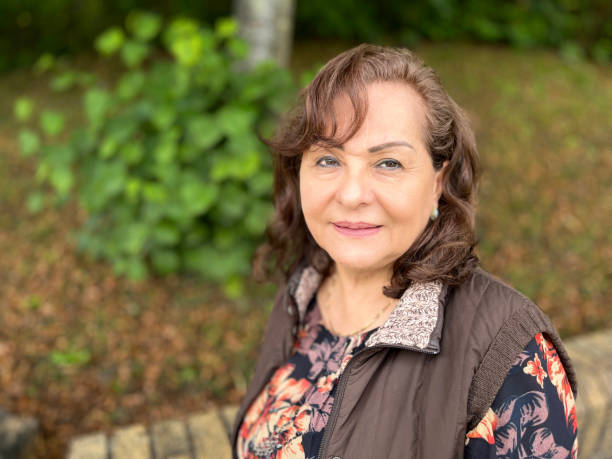 istock Senior Hispanic woman headshot 1615846588