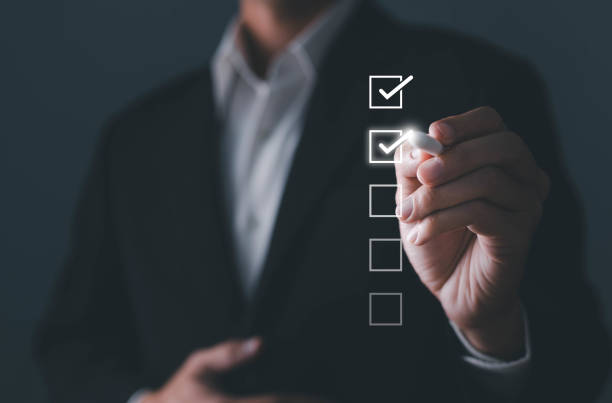 istock Businessman touching to tick correct sign mark in checkbox for quality document control checklist and business approve project concept. 1615880123