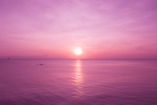 Early morning, pink sunrise over sea