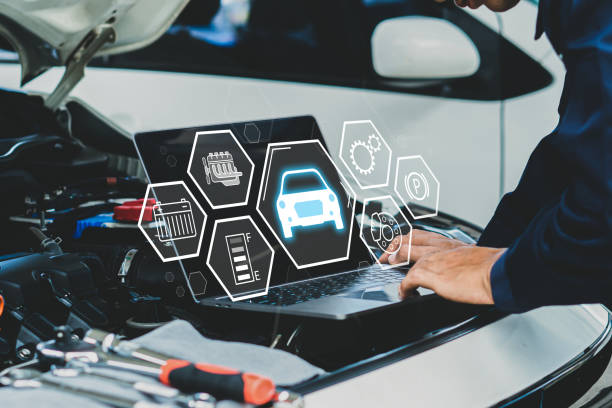 istock Mechanic using laptop to check and repair car engine problem and support car insurance services.Repair service.Car service icon. 1615901596