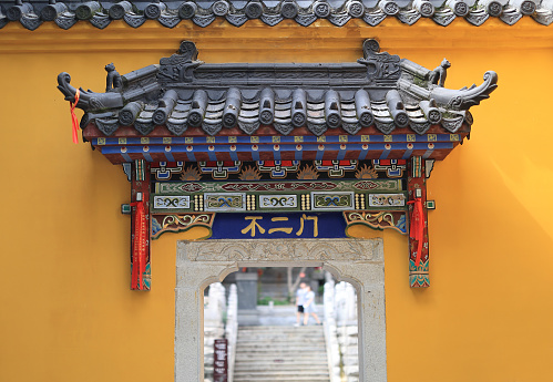 Beijing, China - April 13, 2012: Centre Stairway with Marble Carving of Nine Dragons playing with pearls. Forbidden City.