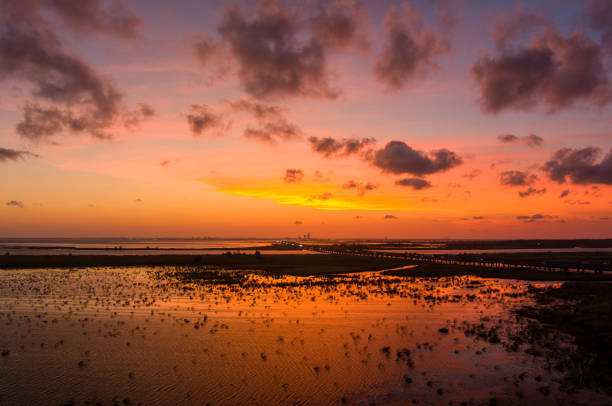 istock Beautiful sky at sunset over Mobile Bay, Alabama 1616000417
