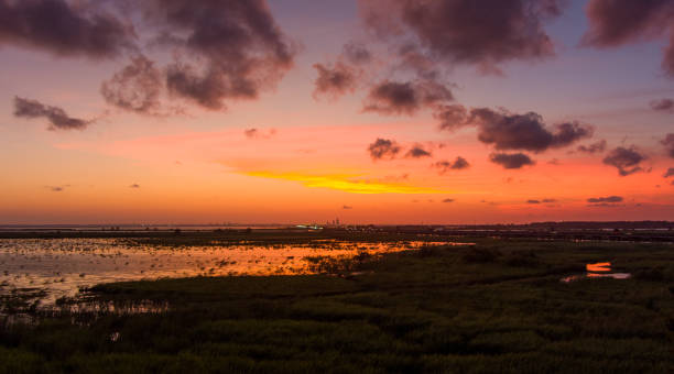 istock Beautiful sky at sunset over Mobile Bay, Alabama 1616002049