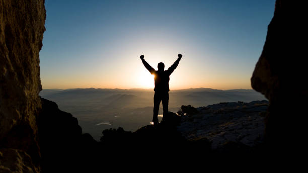 istock Scaling Heights, Igniting Delight: Chronicles of Success on the Summit 1616008024