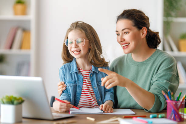 istock Girl doing homework or online education. 1616015709