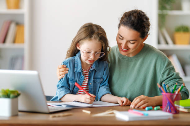 istock Girl doing homework or online education. 1616016319