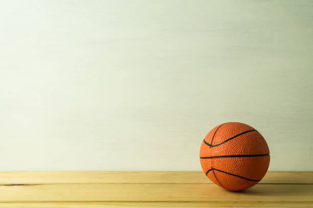 istock Orange basketball model with white background copy space. 1616067616