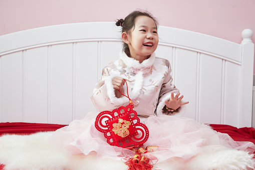 Lively and adorable Mongolian young girl.