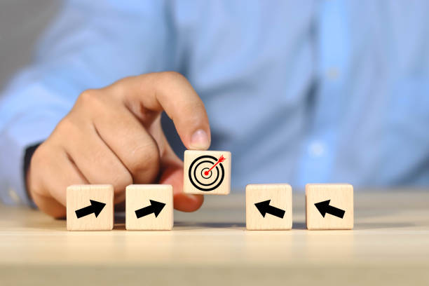 istock Businessman creates goals with business network icons 1616152804