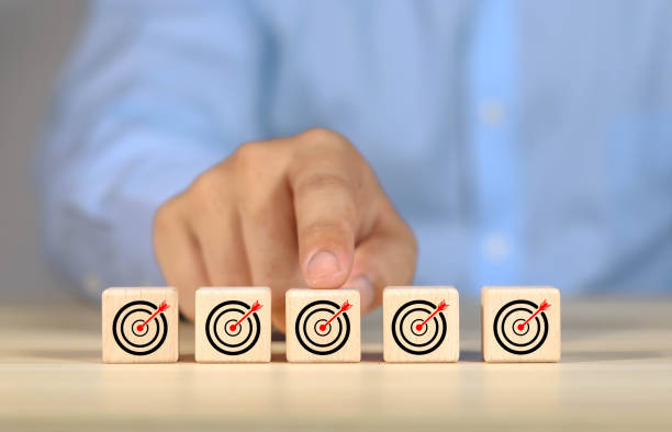 istock Businessman creates goals with business network icons 1616152806