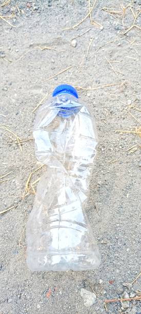 istock The old crumpled transparent plastic bottle 1616163445