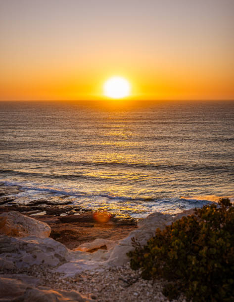 istock Sunset at the beach 1616194421