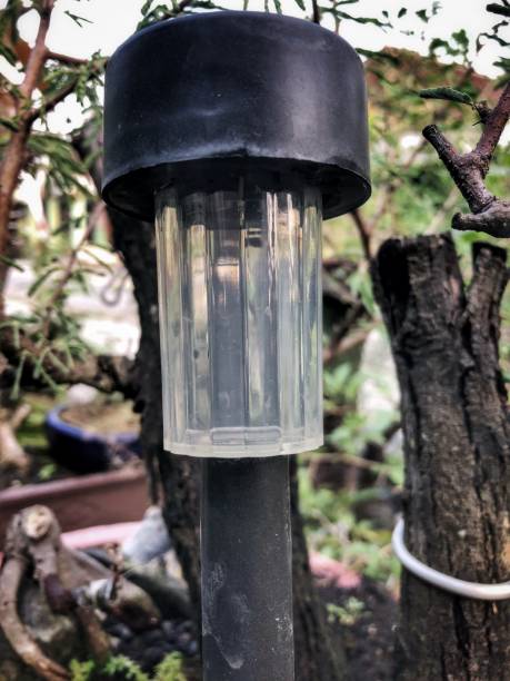 istock a small garden lamp made of plastic and lights up using solar energy 1616211609