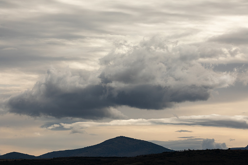 Mountain scenery of the Iberian System on a cloudy day, as seen from Aragon, Spain
