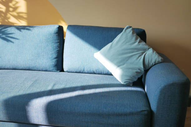 istock modern grey sofa with pillows in living room at home 1616256940