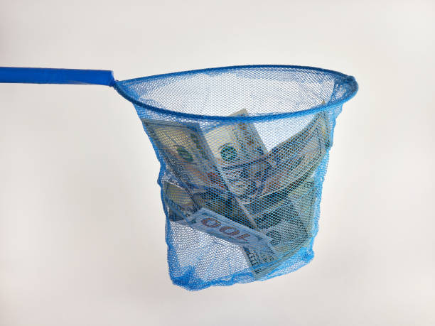 istock 100 dollar bills pour from above and fall into the grid. 1616260875