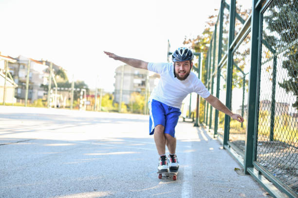 Bearded Male Learning New Skateboard Tricks