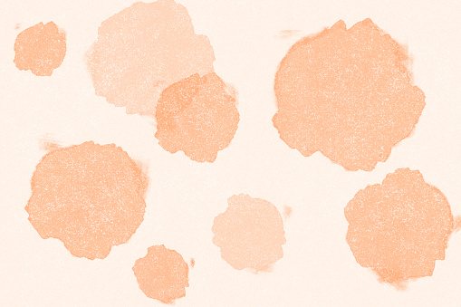 Abstract Background of Watercolor Brush Strokes in Pastel Coral Color