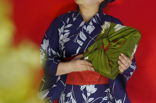 Woman Holding Furoshiki Box/Studio Shot