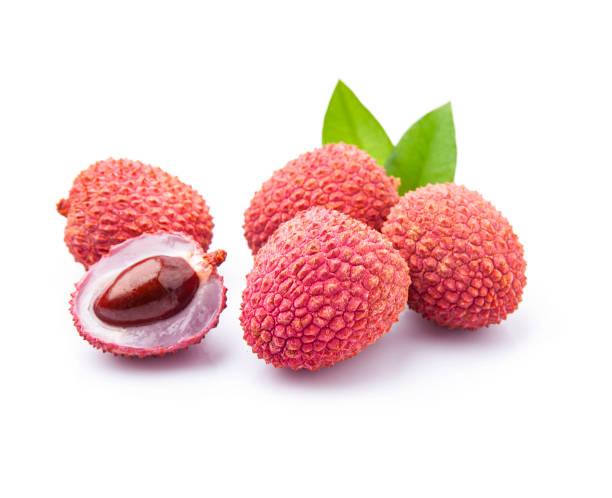 Lychee fruits with leaves on white backgrounds. stock photo