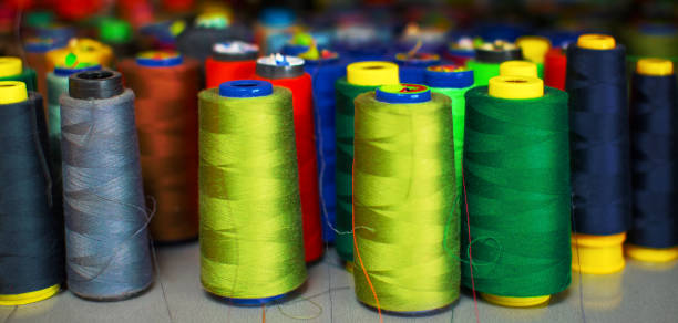 istock A pile of multicolored spools of sewing thread. 1616383856