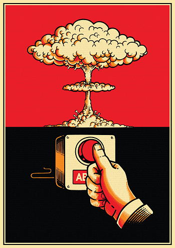 Mushroom cloud rising after nuclear explosion, with red button and human hand
