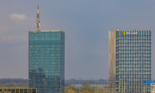 Belgrade, Serbia - April 09, 2023: Two Modern Glass Skyscrapers Usce Towers Buildings With Tall Communication Antenna New Belgrade Spring Day.