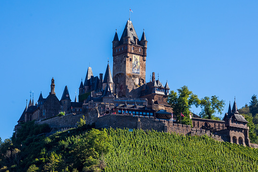 Cochem, Germany - August 1st 2023: Cochem with Imperial Castle. \n\nAbout Cochem:  Cochem is the seat of and the biggest town in the Cochem-Zell district in Rhineland-Palatinate, Germany. With just over 5,000 inhabitants, Cochem falls just behind Kusel, in the Kusel district, as Germany's second smallest district seat. Since 7 June 2009, it has belonged to the Verbandsgemeinde of Cochem.\nSource: Wikipedia
