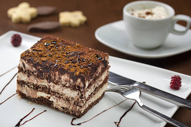 Rows of tiramisu on a wedding table.