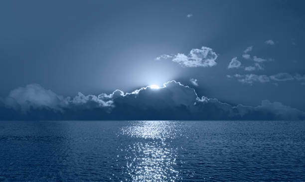 istock Night sky with full moon in the clouds 1616481338