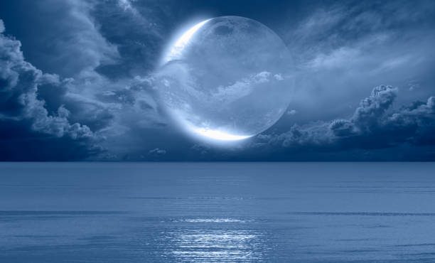 istock Night sky with full moon in the clouds 1616481379