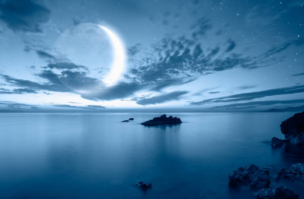 istock Night sky with full moon in the clouds 1616484119