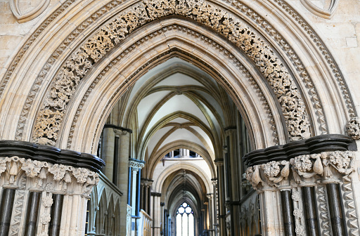 Lincoln Cathedral (rebuilt from the Norman style beginning in 1192), is the best example of the fully mature early Gothic style. The master-builder, Geoffrey de Noiers, was French, but he constructed a church with distinct non-French features; double transepts, an elongated nave, complexity of interior space, and a more lavish use of decorative features.