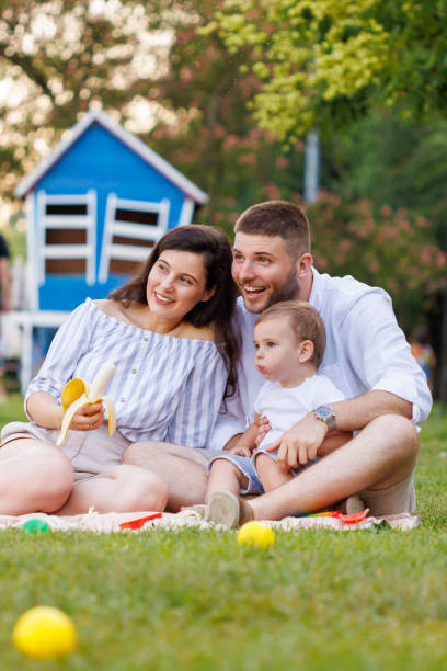 istock Parents on a picnic with their child 1616490827