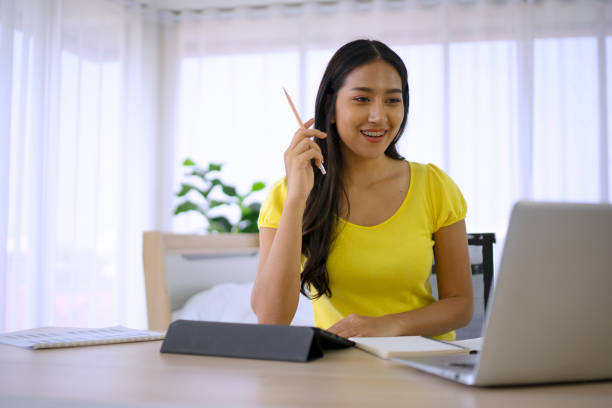 istock Young woman is working at home. 1616492517