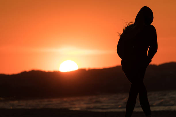 Silhouette of a person on the beach
