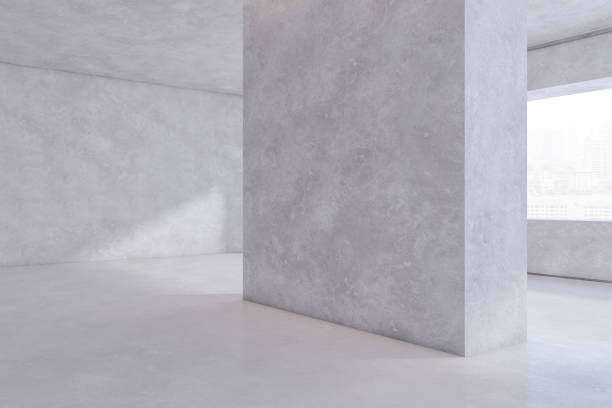 istock Contemporary concrete exhibition hall interior with blank mock up place on wall and window with city view. 3D Rendering. 1616524484