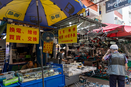 Hong Kong - August 15, 2023 : People at the flea market in Sham Shui Po, Kowloon, Hong Kong.